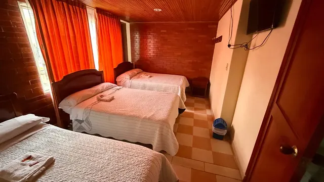 Habitación familiar con varias camas