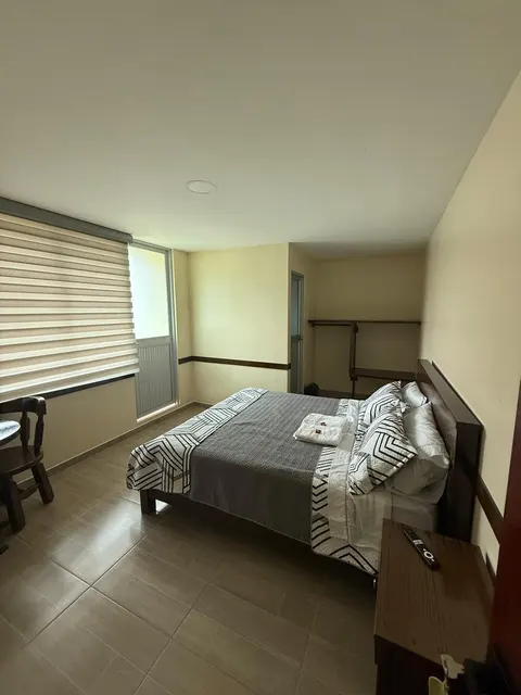 Habitación doble con puerta al balcón